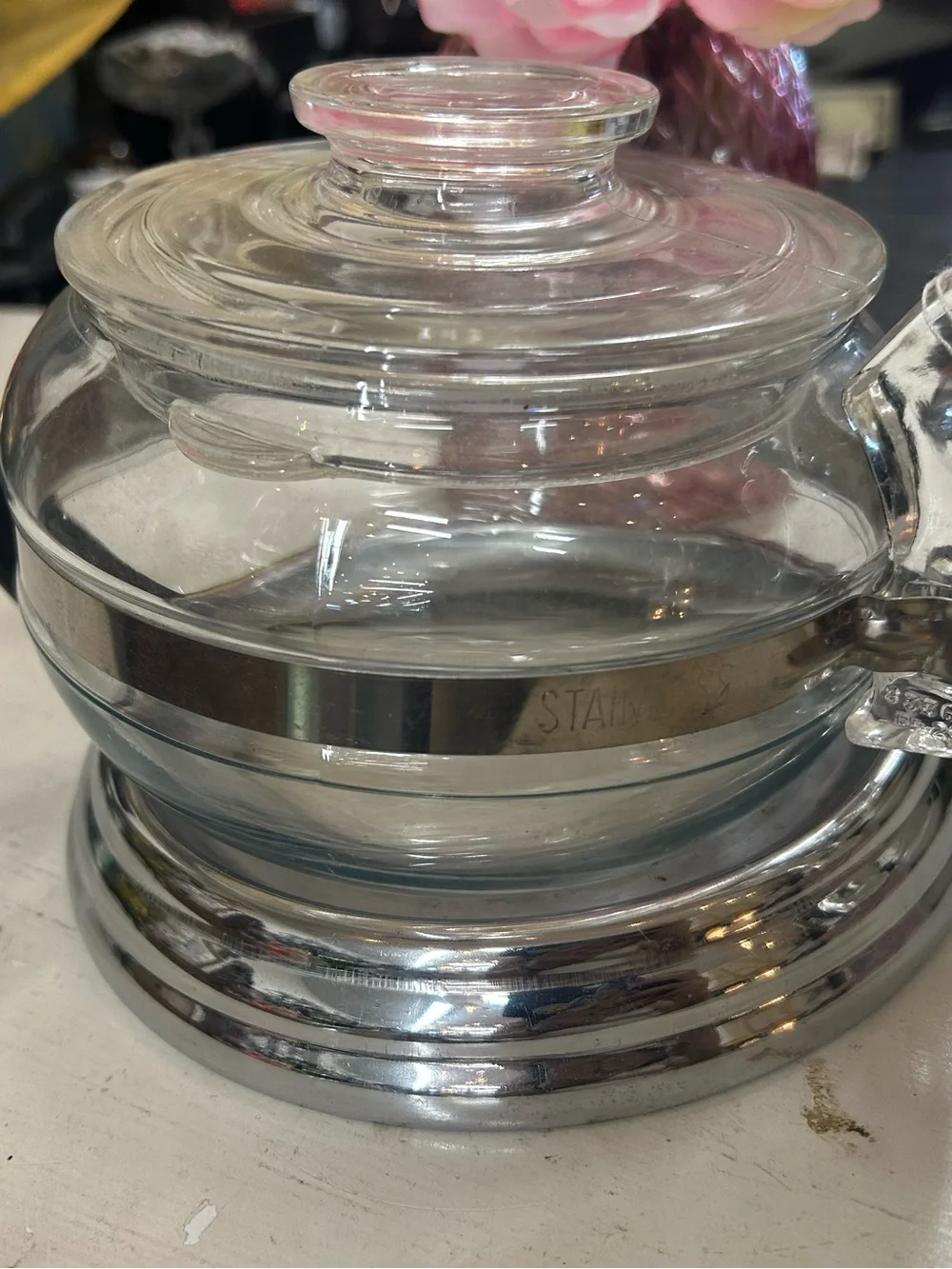 vintage Pyrex Flameware teapot, stovetop use and has a 6-cup capacity